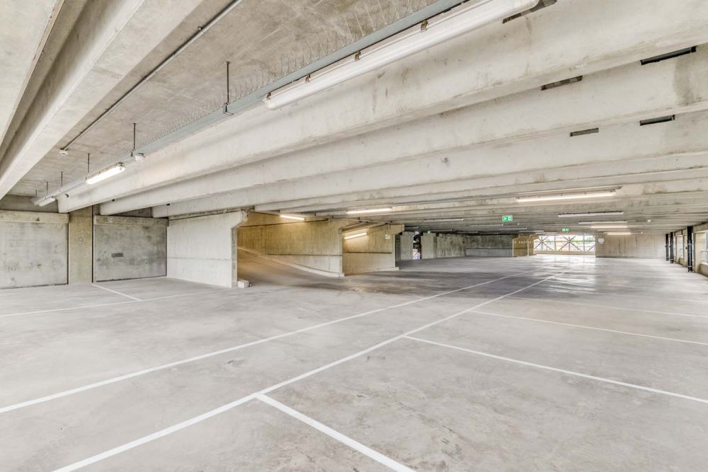 A private multi-storey car park with large roof (Brentford, London)