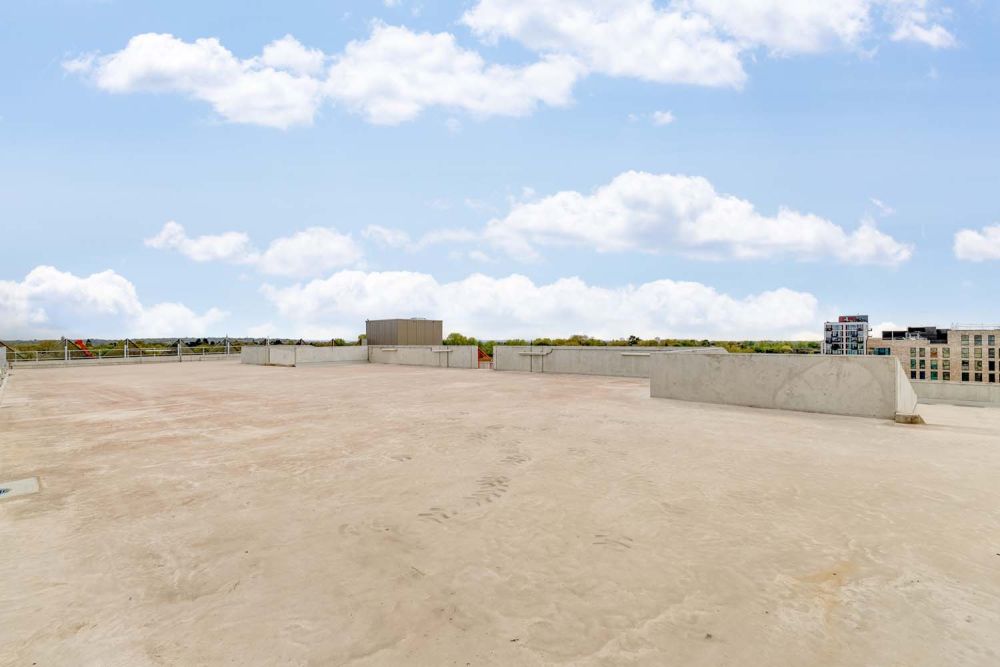 A private multi-storey car park with large roof (Brentford, London)