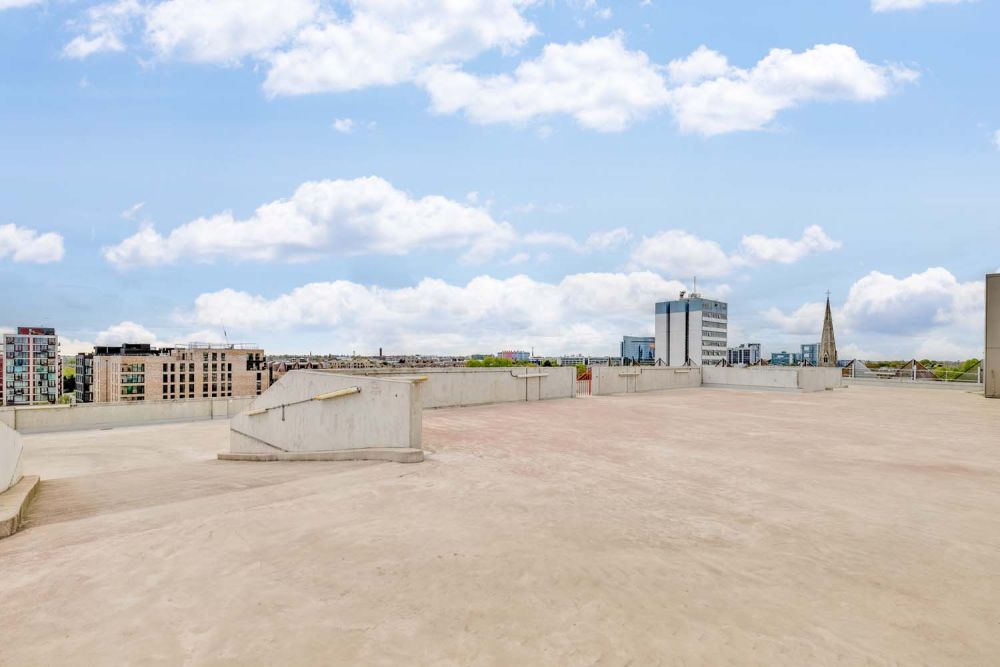 A private multi-storey car park with large roof (Brentford, London)