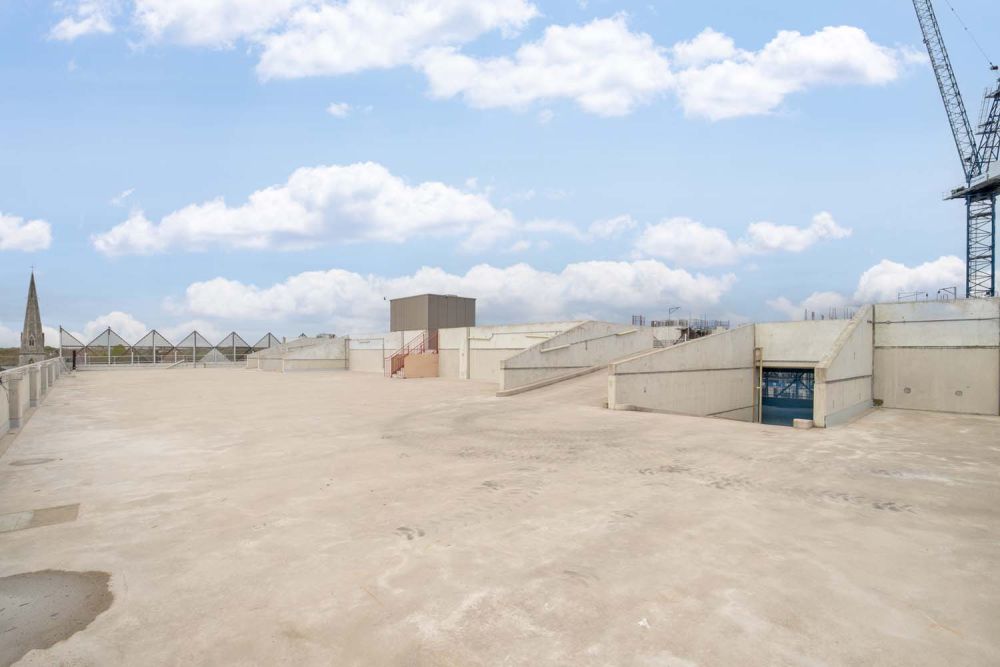 A private multi-storey car park with large roof (Brentford, London)