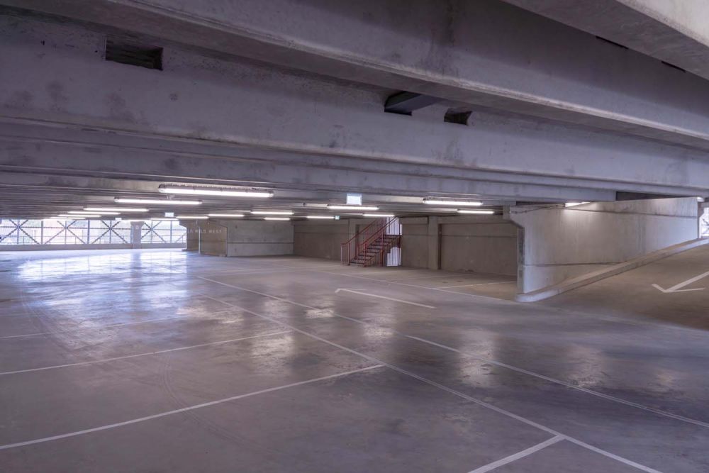 A private multi-storey car park with large roof (Brentford, London)