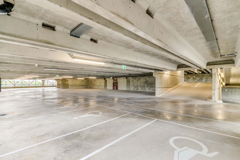 A private multi-storey car park with large roof (Brentford, London)