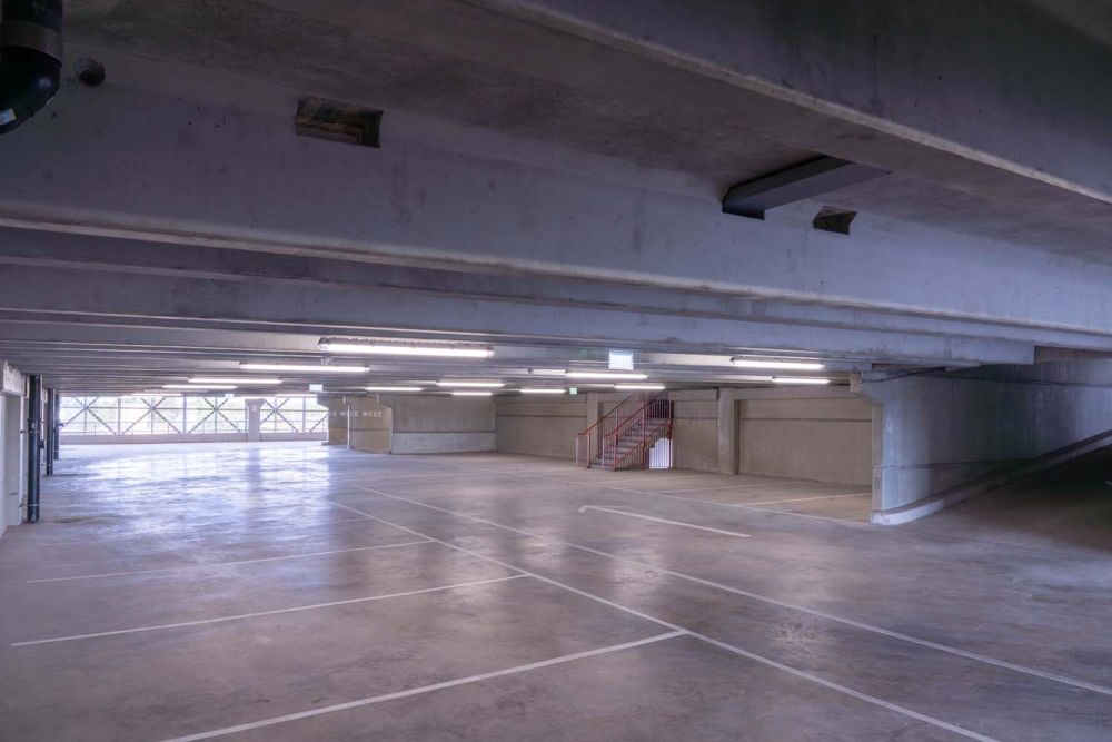 A private multi-storey car park with large roof (Brentford, London)