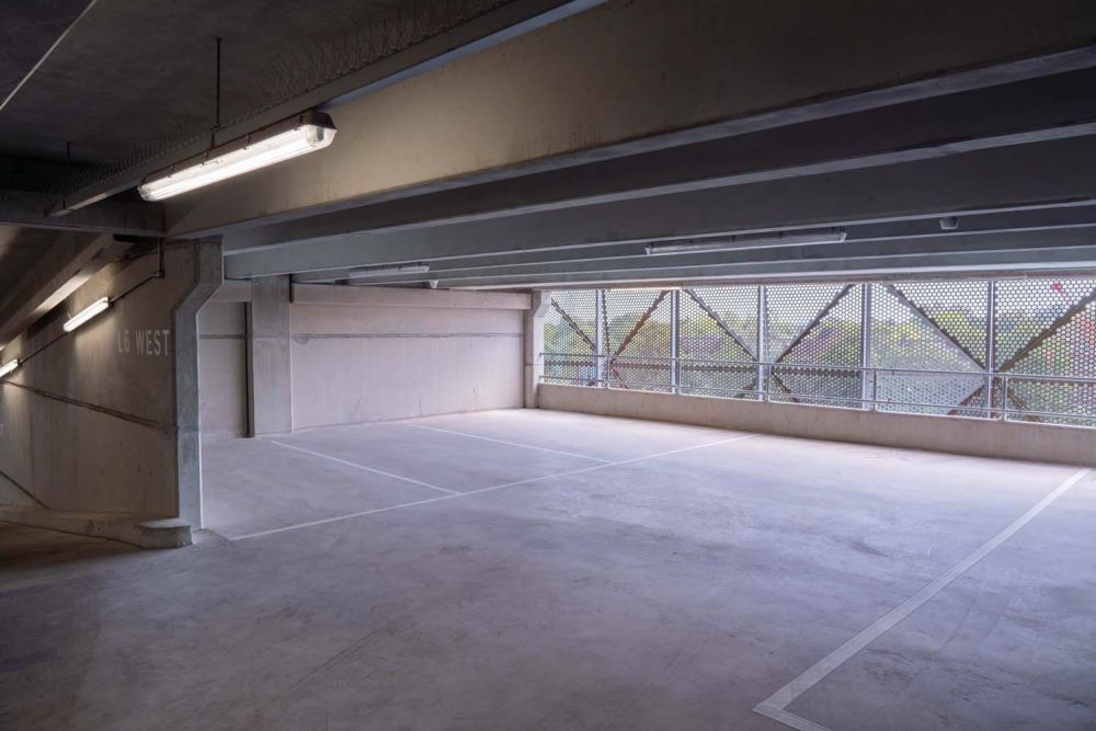 A private multi-storey car park with large roof (Brentford, London)