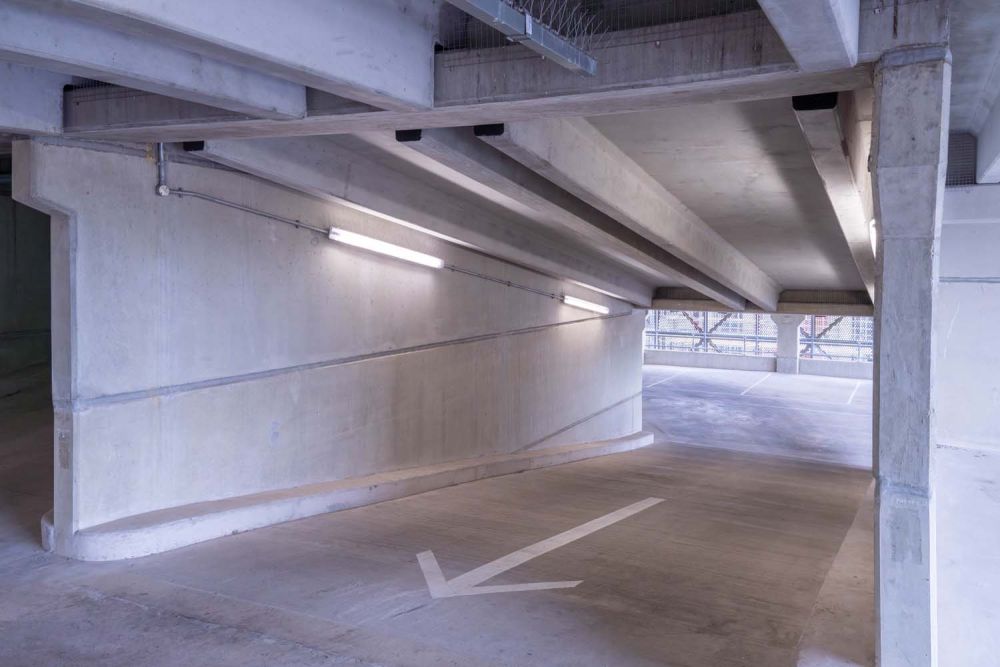 A private multi-storey car park with large roof (Brentford, London)