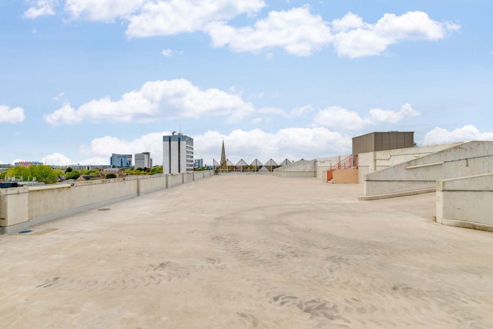 A private multi-storey car park with large roof (Brentford, London)