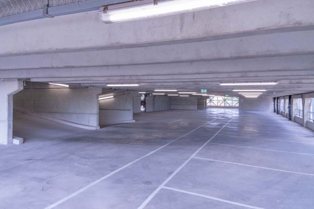 A private multi-storey car park with large roof (Brentford, London)