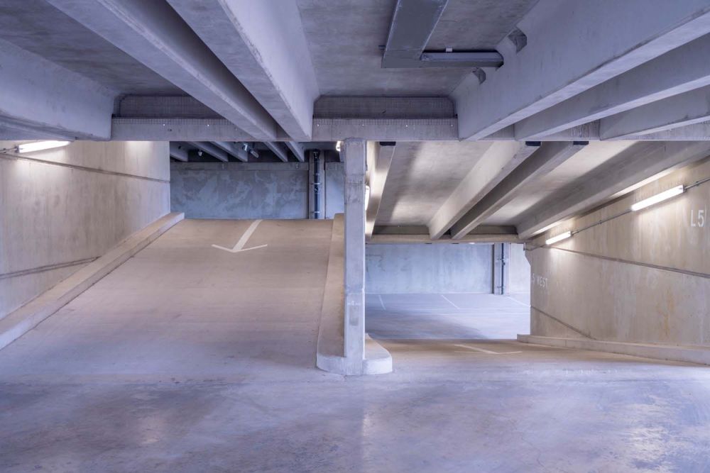 A private multi-storey car park with large roof (Brentford, London)