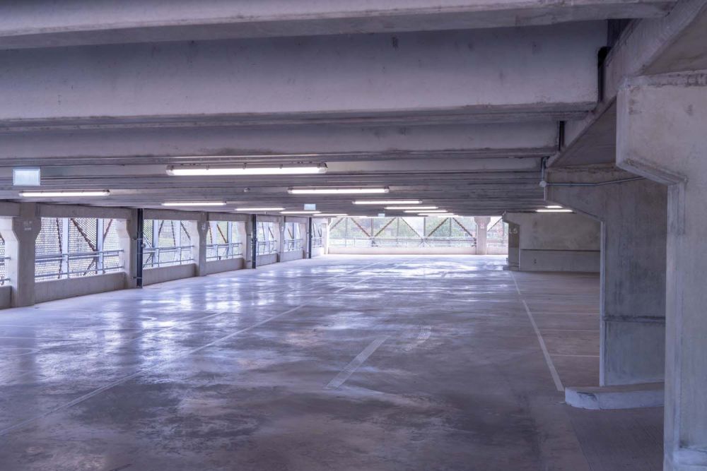 A private multi-storey car park with large roof (Brentford, London)
