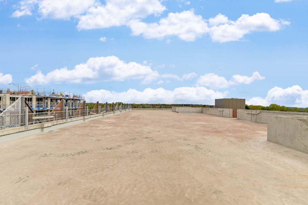 A private multi-storey car park with large roof (Brentford, London)