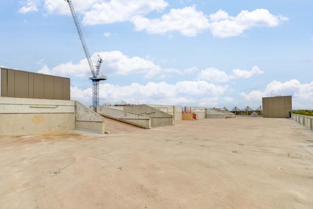 A private multi-storey car park with large roof (Brentford, London)