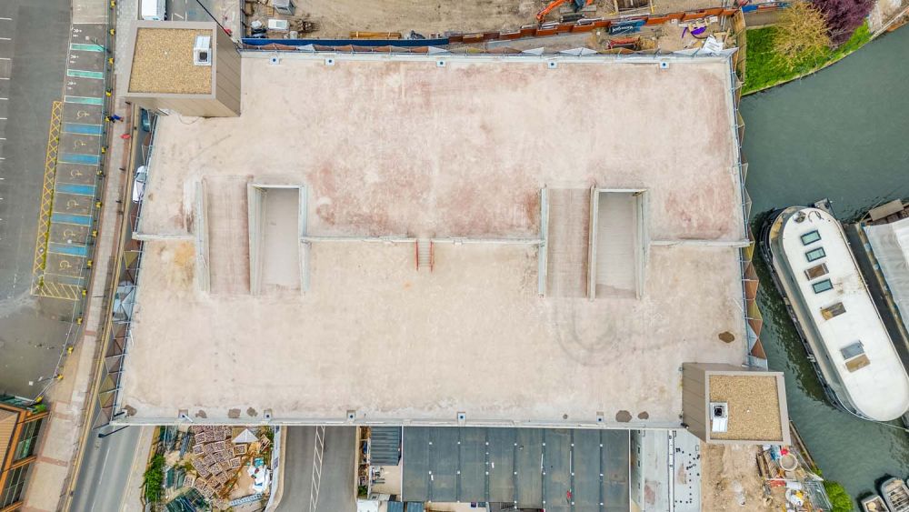 A private multi-storey car park with large roof (Brentford, London)