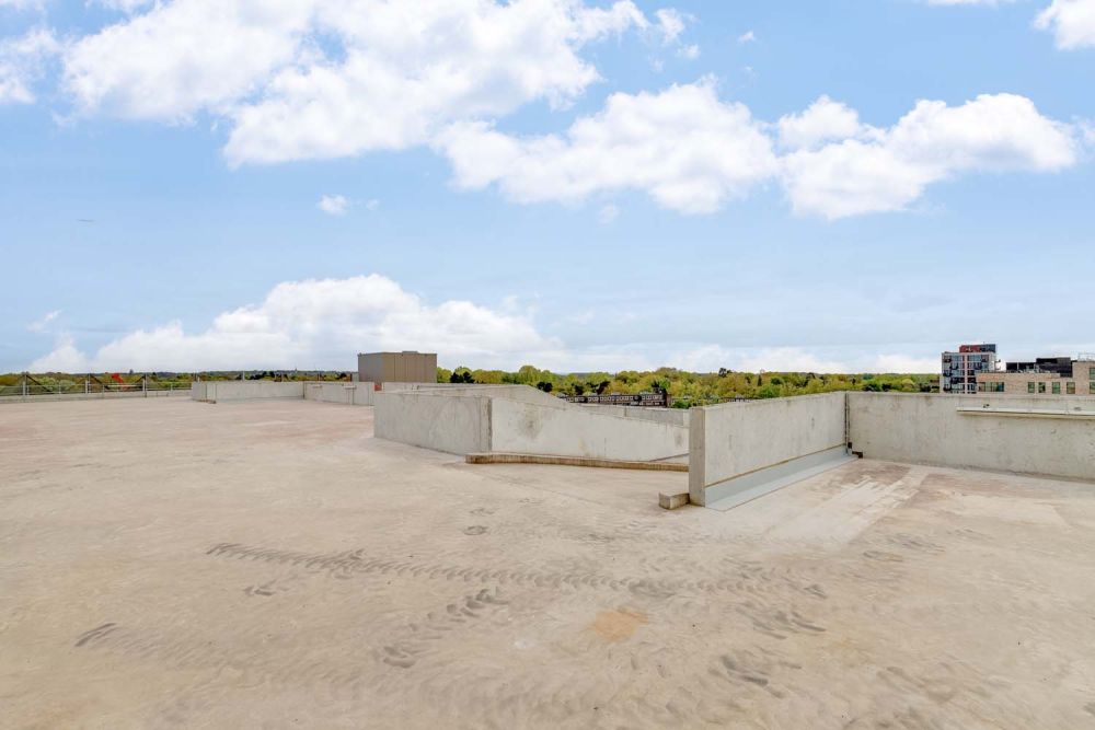 A private multi-storey car park with large roof (Brentford, London)