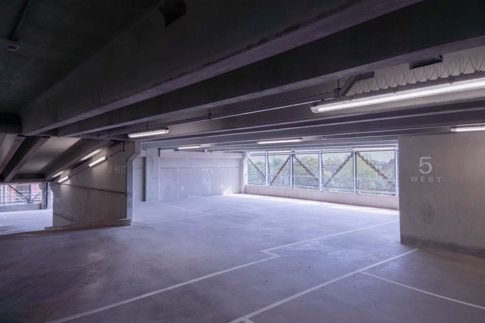 A private multi-storey car park with large roof (Brentford, London)