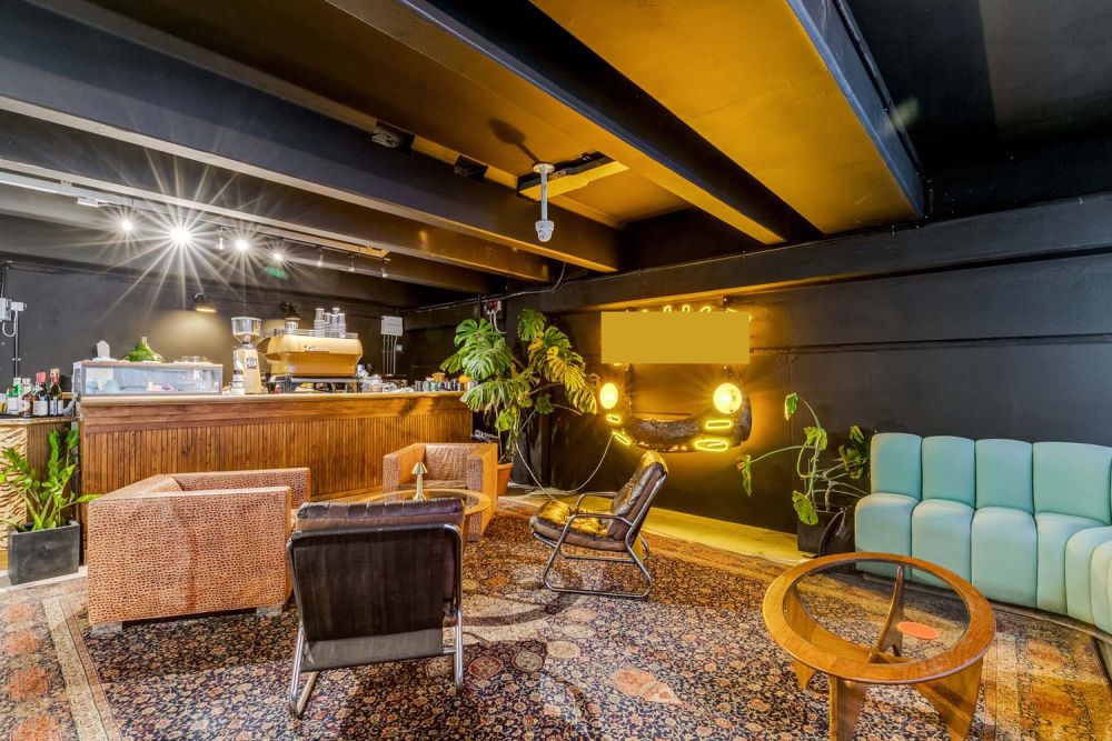 Classic car showroom for film and photoshoot hire (Brentford, London)