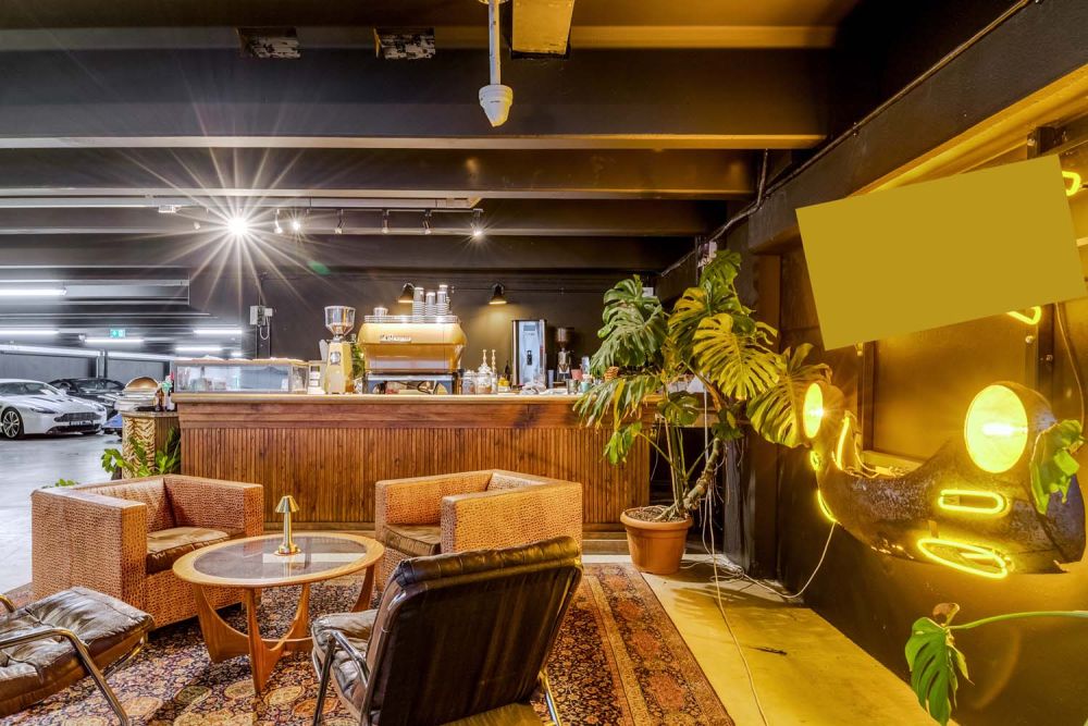 Classic car showroom for film and photoshoot hire (Brentford, London)