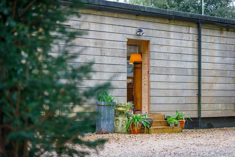 An architecturally unique timber-clad  home in the South Downs