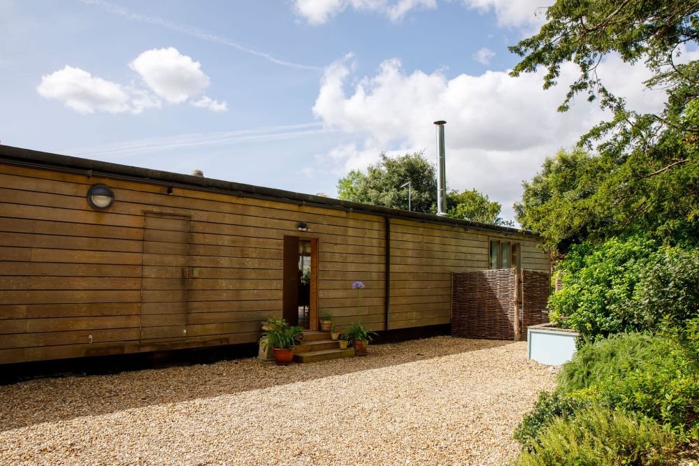 An architecturally unique timber-clad  home in the South Downs