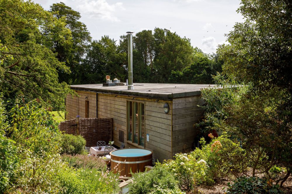 An architecturally unique timber-clad  home in the South Downs