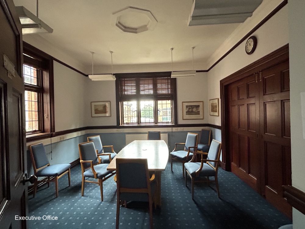 Town hall with meeting rooms, council chambers and period offices. (Reigate, Surrey)
