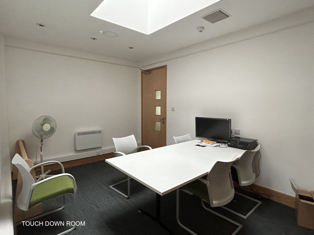 Town hall with meeting rooms, council chambers and period offices. (Reigate, Surrey)