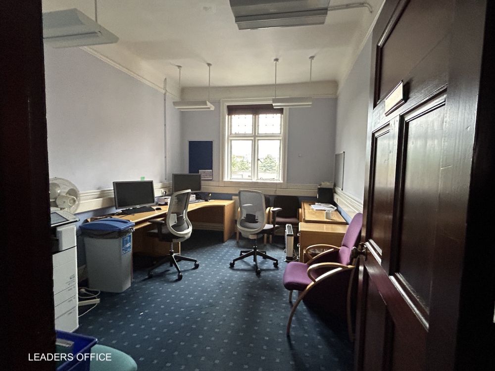Town hall with meeting rooms, council chambers and period offices. (Reigate, Surrey)