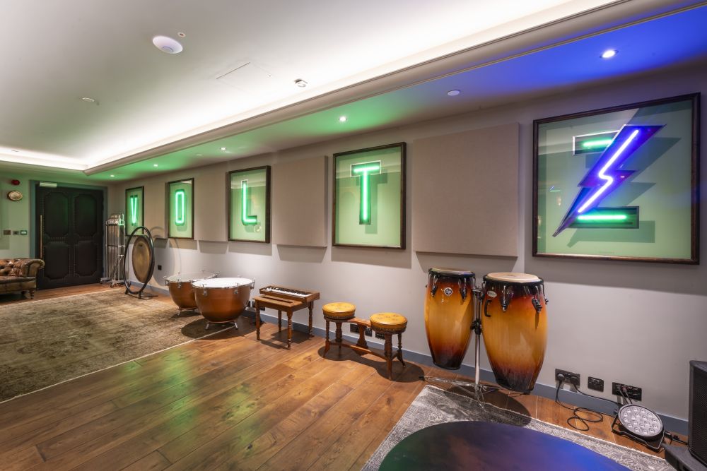 An underground private bar and recording studio with vintage retro touches