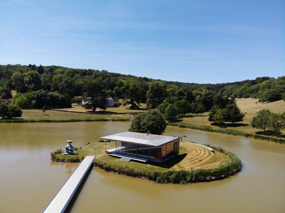 Modern Glass Pavilion set on Island in a Lake on a private country estate