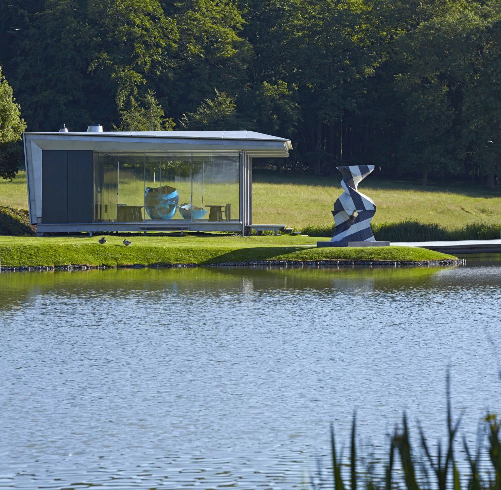 Modern Glass Pavilion set on Island in a Lake on a private country estate