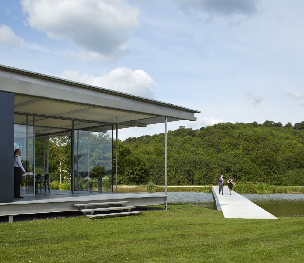 Modern Glass Pavilion set on Island in a Lake on a private country estate