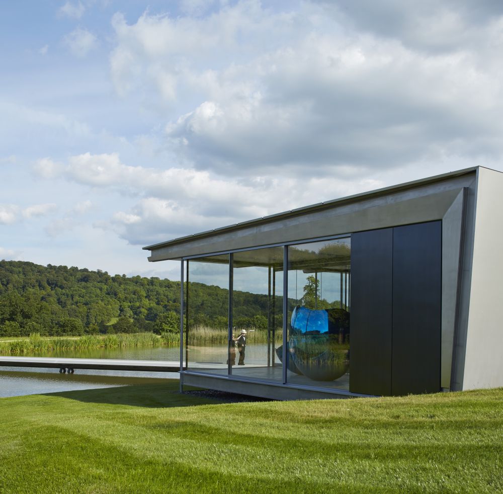 Modern Glass Pavilion set on Island in a Lake on a private country estate