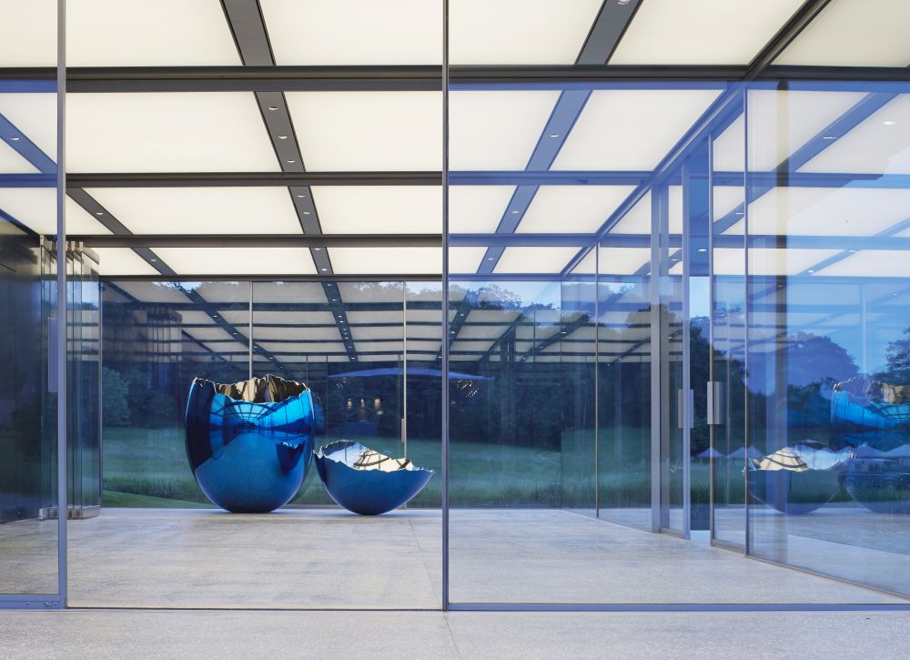 Modern Glass Pavilion set on Island in a Lake on a private country estate